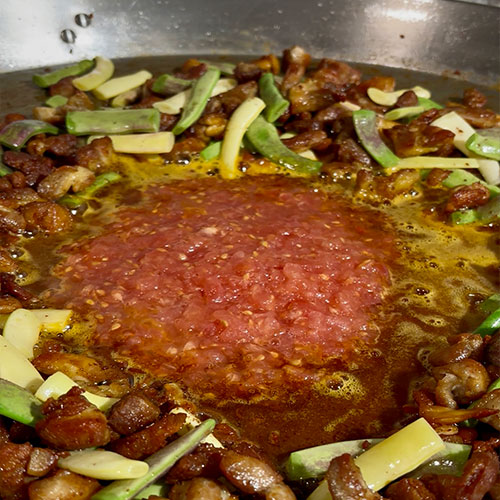 Add the tomato