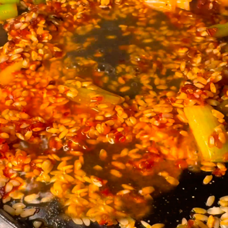7.- Add broth and saffron infusion