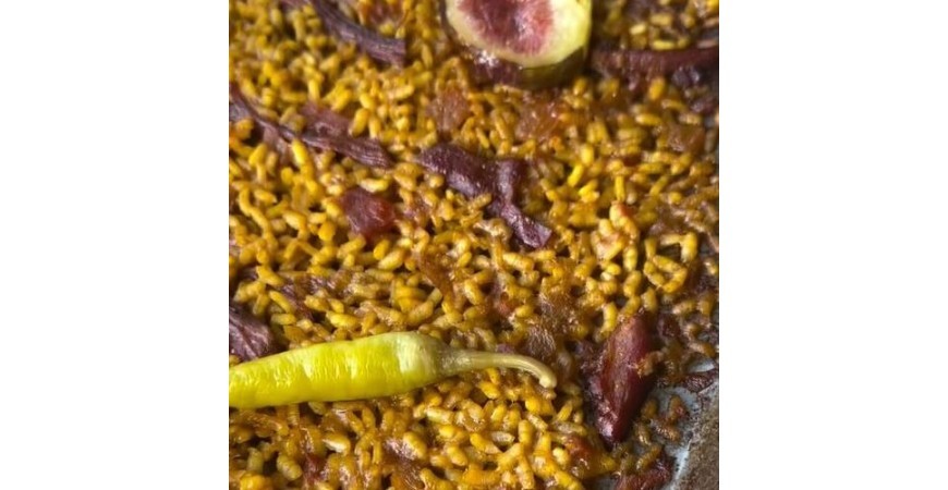 Recipe from @fanaticook: Paella with confit duck, caramelized figs, and piparras