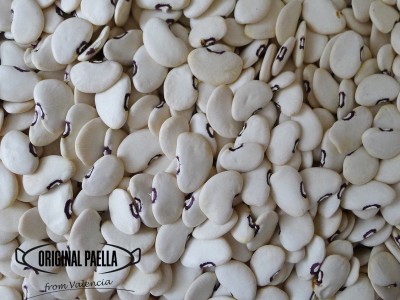 What is garrofón and why is it essential in Valencian paella?